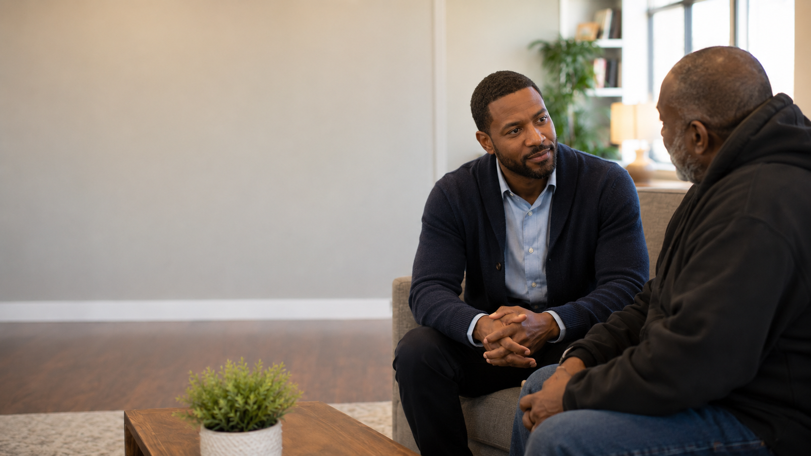 A peer recovery specialist having a supportive conversation with a member